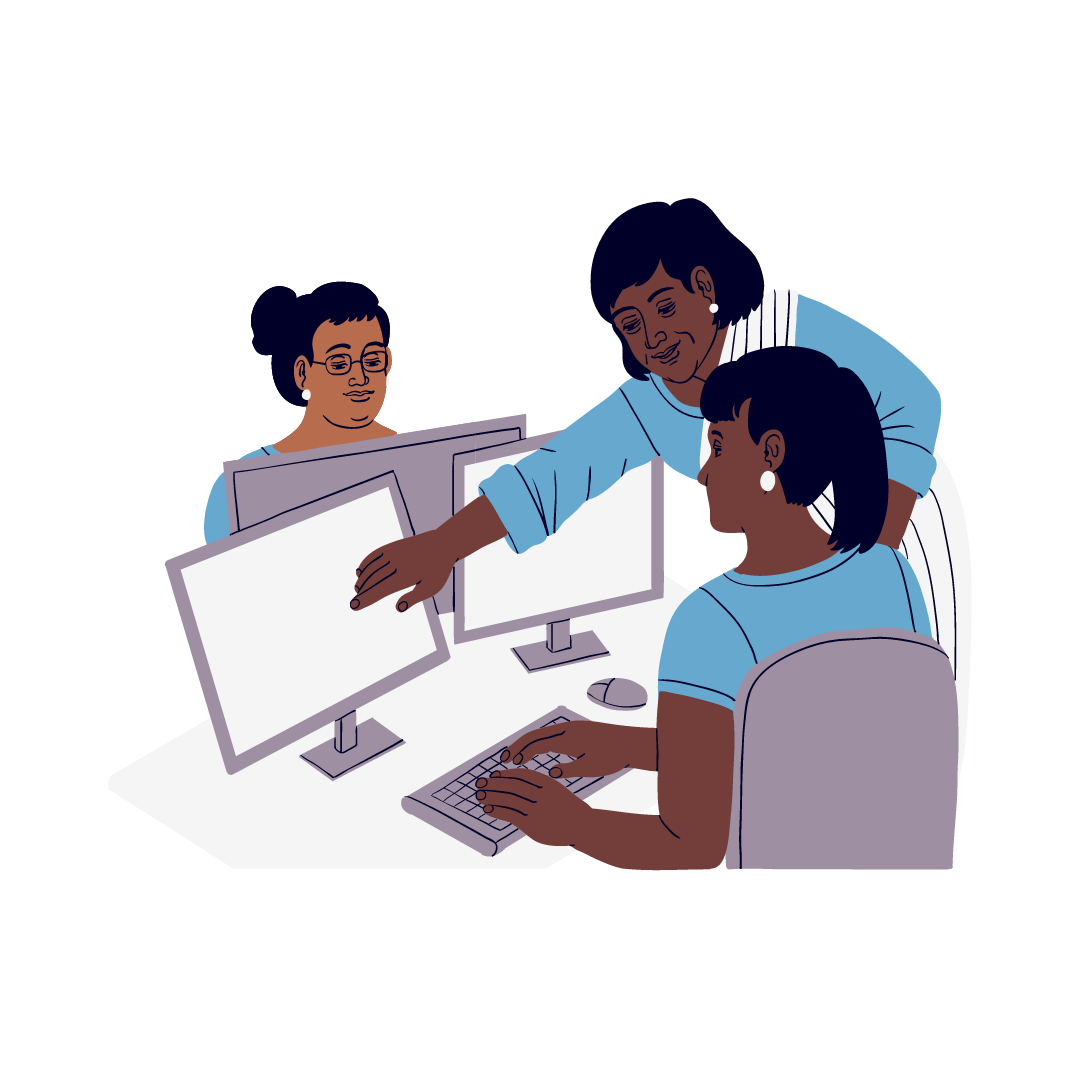 Three women work on research together at a